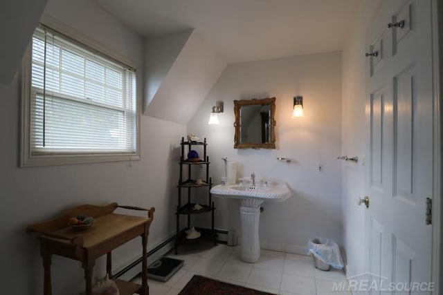 bathroom featuring tile patterned floors and baseboard heating