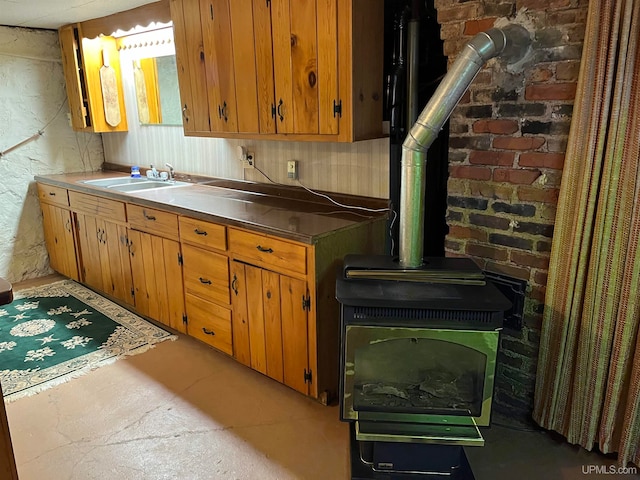 kitchen with sink and brick wall