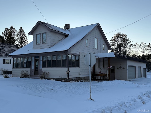 view of front of property with a garage