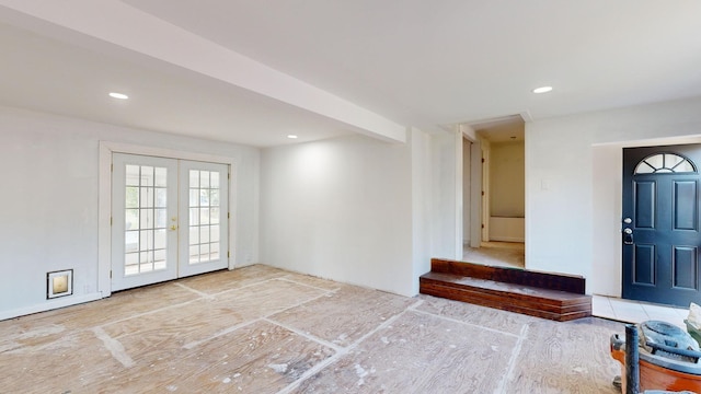 entryway featuring french doors