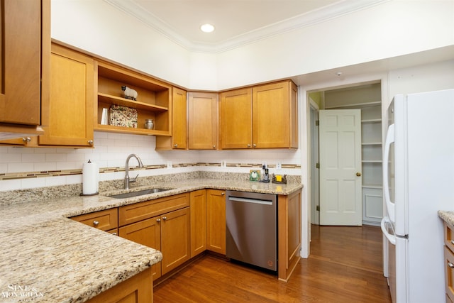 kitchen with sink, white refrigerator, stainless steel dishwasher, and dark hardwood / wood-style floors