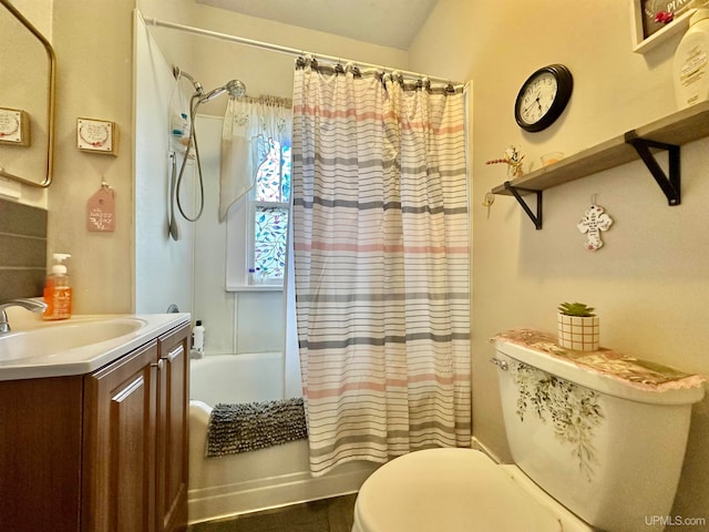 full bathroom featuring vanity, toilet, and shower / tub combo with curtain