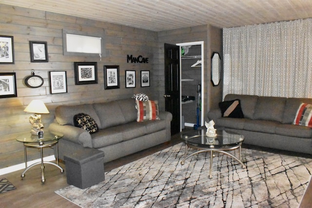 living room featuring wood-type flooring and wood ceiling