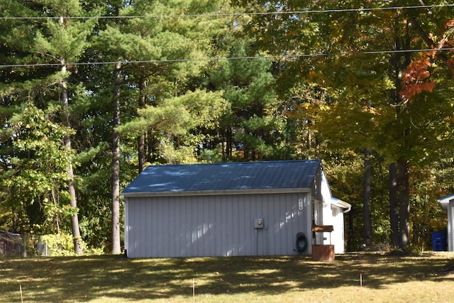 view of outdoor structure featuring a yard