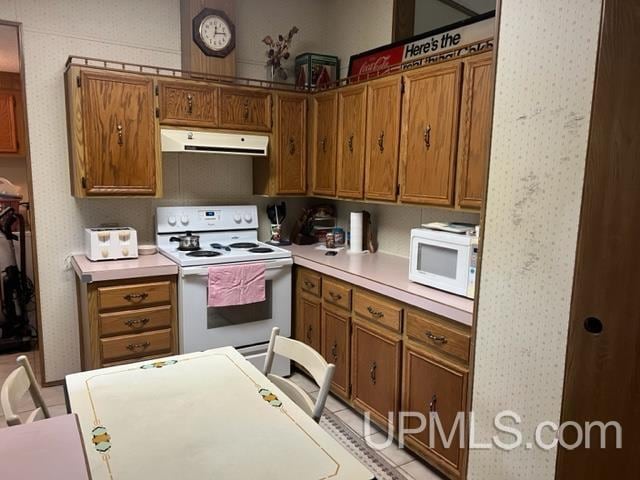 kitchen featuring white appliances