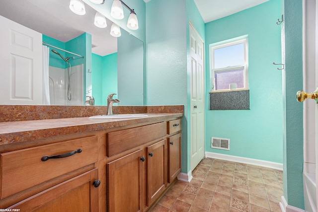 bathroom with vanity and shower / bathing tub combination