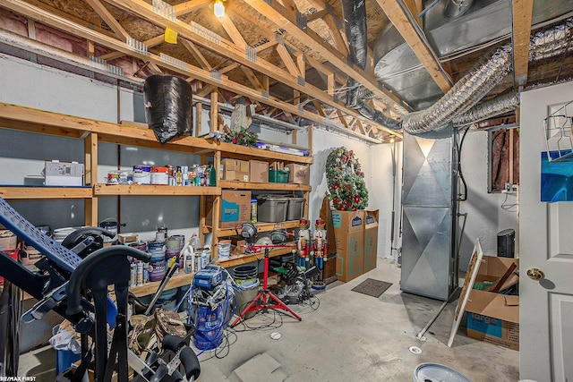 basement featuring heating unit