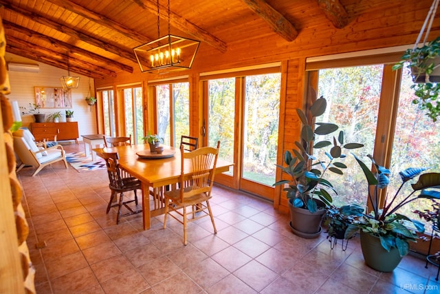 tiled dining room featuring a notable chandelier, wooden ceiling, lofted ceiling with beams, and wooden walls