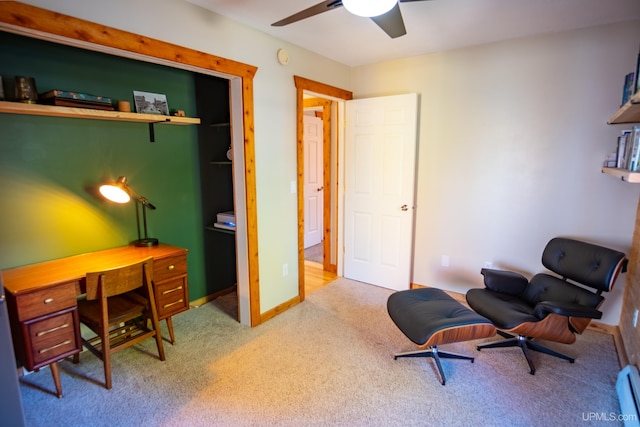 office featuring ceiling fan and carpet