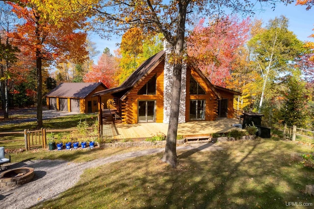 back of house featuring a yard