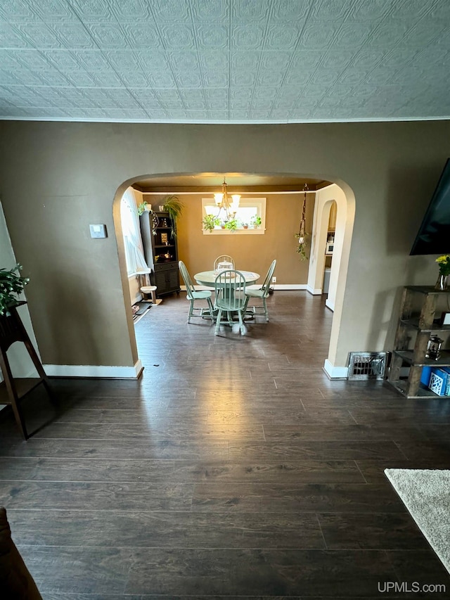 dining space featuring dark hardwood / wood-style flooring