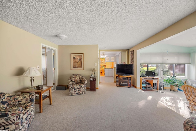 living room featuring a textured ceiling and carpet floors