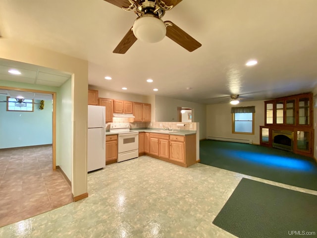 kitchen featuring a baseboard radiator, a sink, white appliances, ceiling fan, and under cabinet range hood