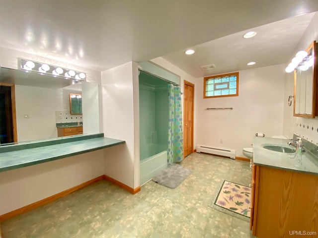 bathroom with vanity, a baseboard heating unit, and toilet