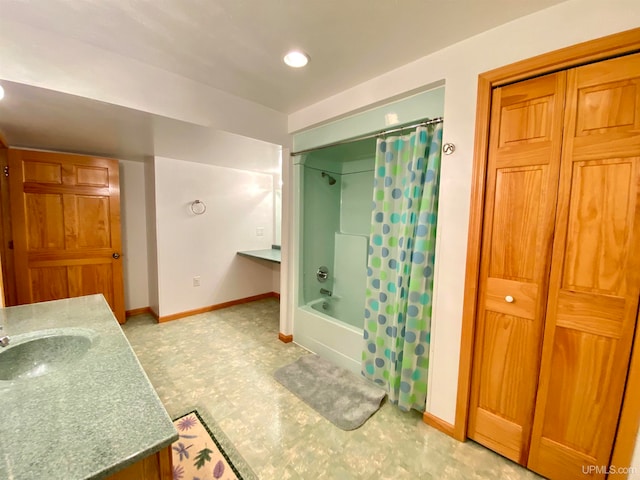 bathroom featuring vanity and shower / tub combo