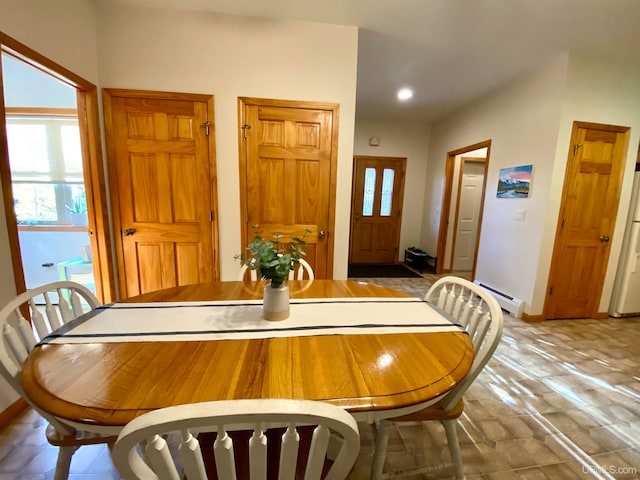 dining room with a baseboard radiator