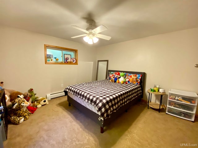 carpeted bedroom featuring a baseboard heating unit and ceiling fan