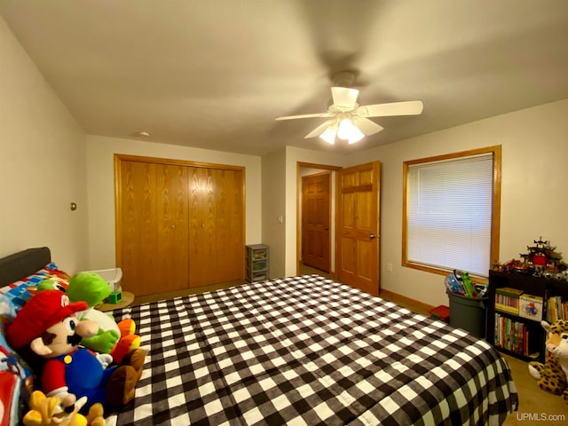 bedroom featuring a closet and ceiling fan