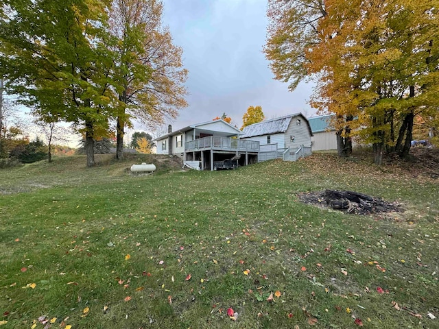 view of yard featuring a wooden deck