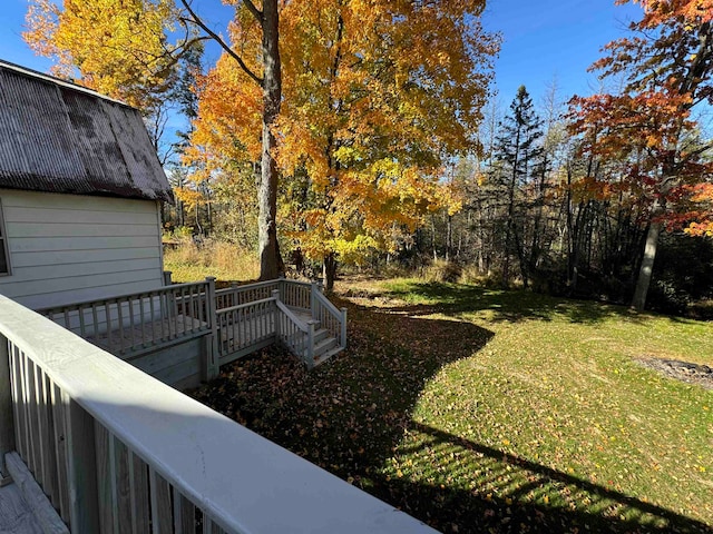 view of yard featuring a wooden deck