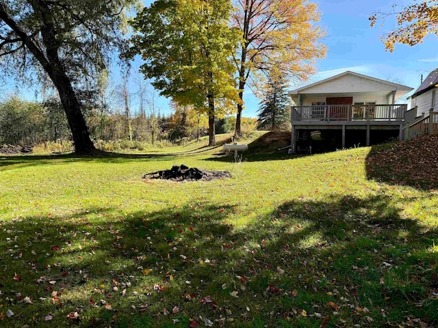 view of yard featuring a deck