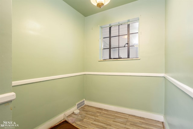 empty room featuring hardwood / wood-style floors