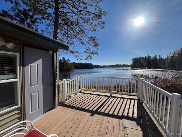 wooden terrace with a water view