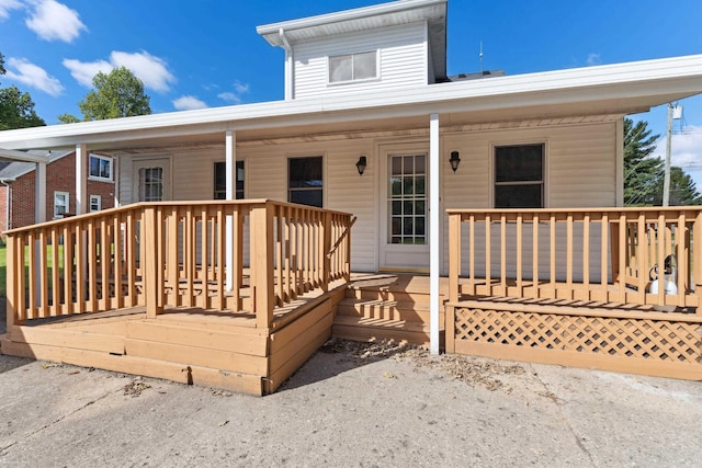 exterior space featuring a wooden deck