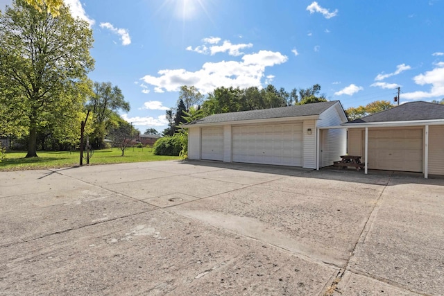 garage with a yard