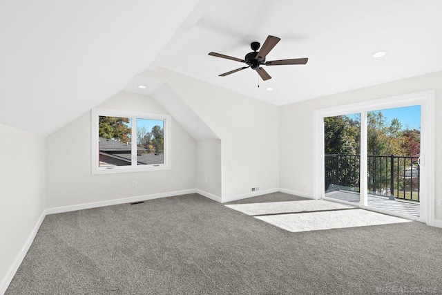 bonus room featuring ceiling fan, carpet, and vaulted ceiling