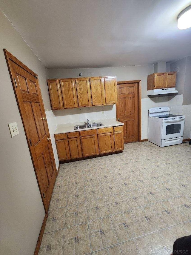 kitchen with white electric range and sink