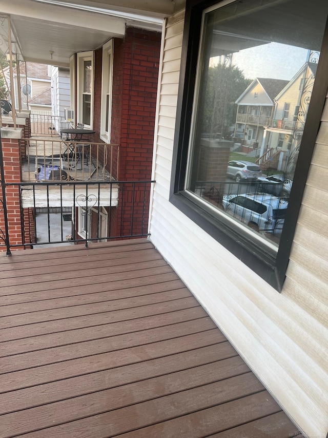 wooden deck featuring covered porch