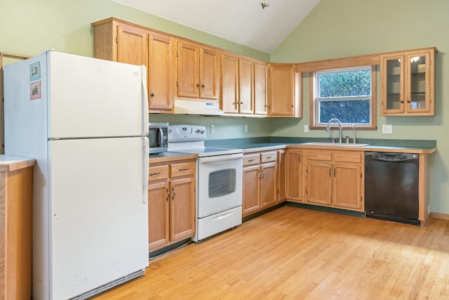 kitchen featuring light hardwood / wood-style floors, sink, vaulted ceiling, and white appliances