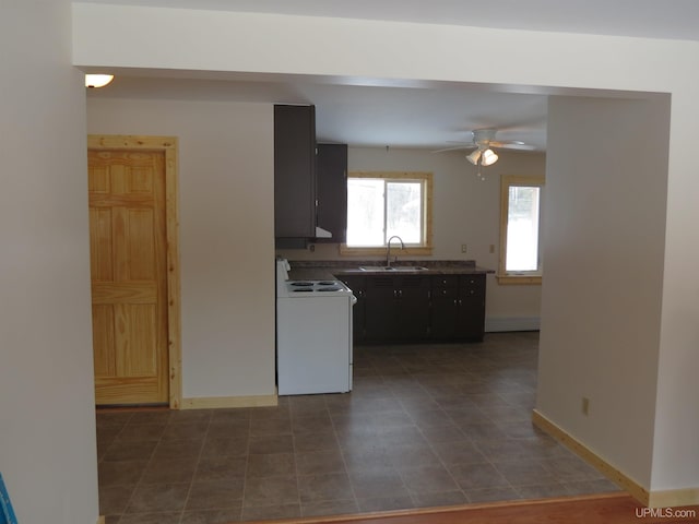 kitchen featuring electric stove, sink, and ceiling fan