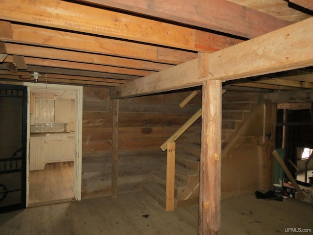 basement with wood-type flooring