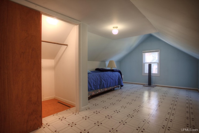 bedroom with vaulted ceiling