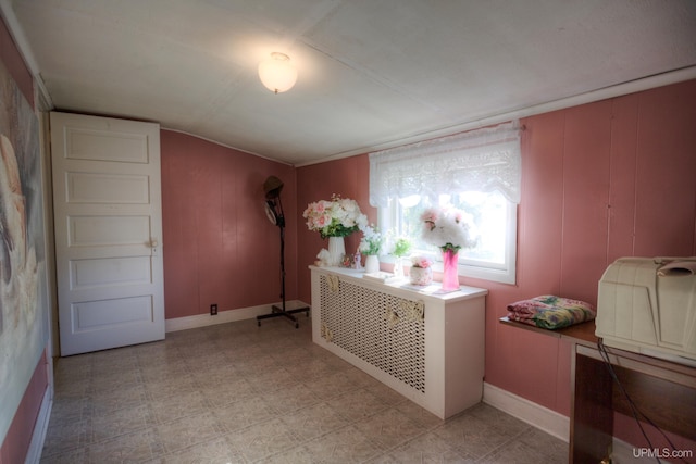 interior space featuring wooden walls