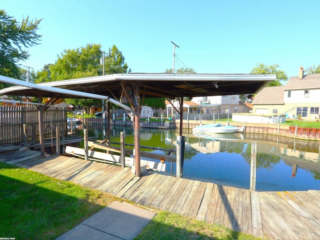 dock area with a water view