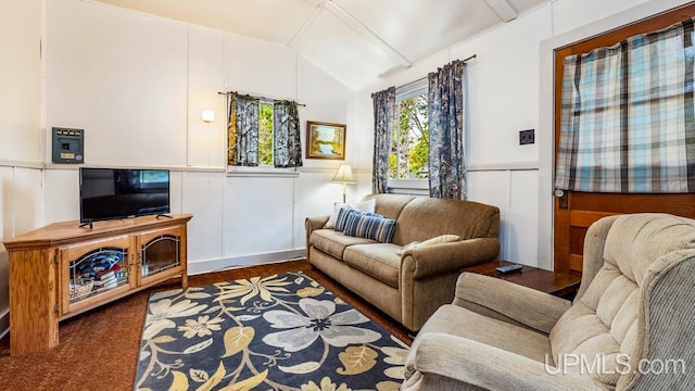 living room with vaulted ceiling