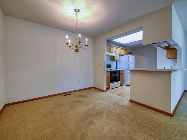 unfurnished living room with a chandelier and light colored carpet