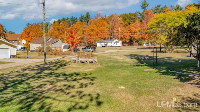 view of yard featuring a garage