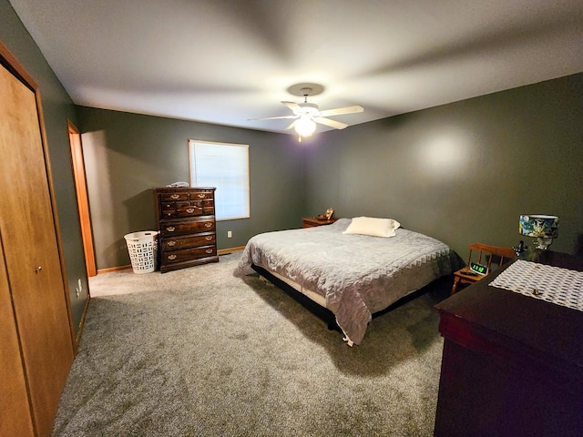 5206 Wolf Ln, Farwell, MI 48622 - bedroom with carpet, ceiling fan, and baseboards