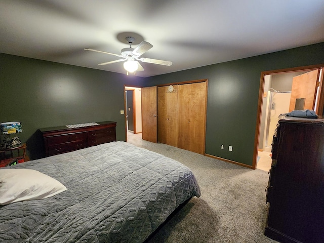 5206 Wolf Ln, Farwell, MI 48622 - bedroom with carpet floors, a closet, a ceiling fan, and baseboards