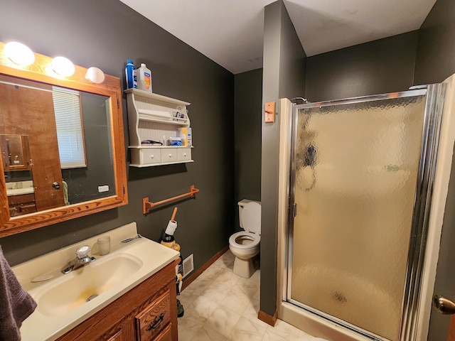 5206 Wolf Ln, Farwell, MI 48622 - bathroom with a stall shower, vanity, toilet, and marble finish floors