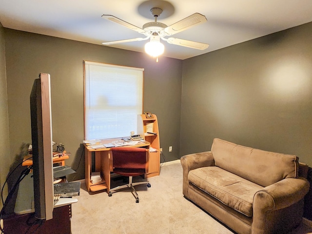 office with light colored carpet and ceiling fan