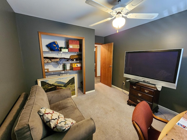 5206 Wolf Ln, Farwell, MI 48622 - living room with a ceiling fan, carpet floors, and baseboards
