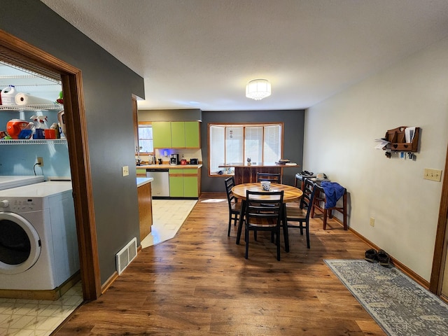 5206 Wolf Ln, Farwell, MI 48622 - dining room with light wood-style floors and baseboards