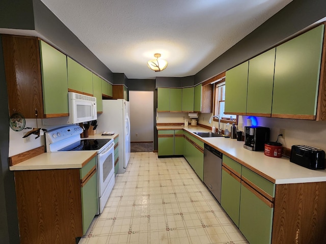 5206 Wolf Ln, Farwell, MI 48622 - kitchen with white appliances, a sink, light floors, light countertops, and a textured ceiling