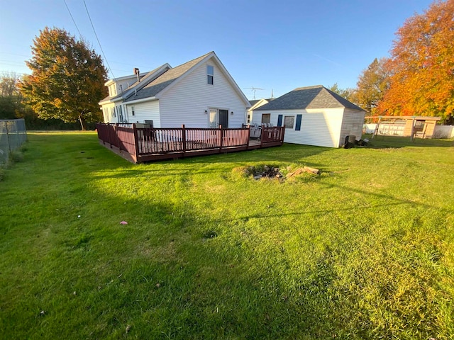 view of yard featuring a wooden deck