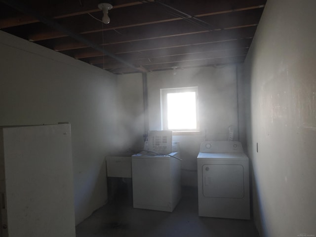 7502 Kauffman Blvd, Presque Isle, MI 49777 - laundry area featuring separate washer and dryer